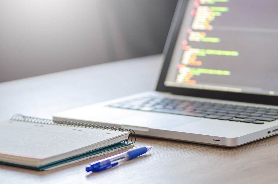 Laptop with Python code on screen